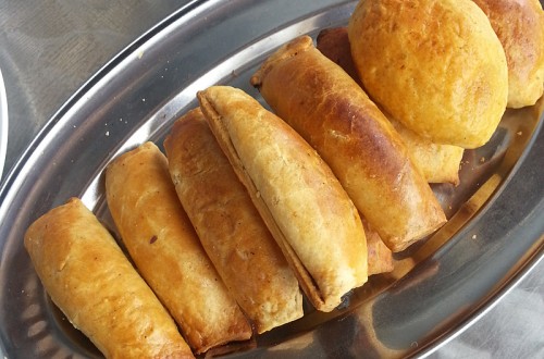 Pang Susie (sweet potato dough bun with meat filling) and Sardine Puffs at Mary's Kafe. Both of these items are coming to The Bakery.